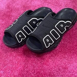 Nike Air Slides.